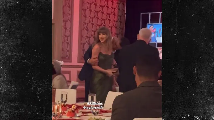 Travis Kelce Covers Taylor Swift's Arm With Kisses At Las Vegas Gala